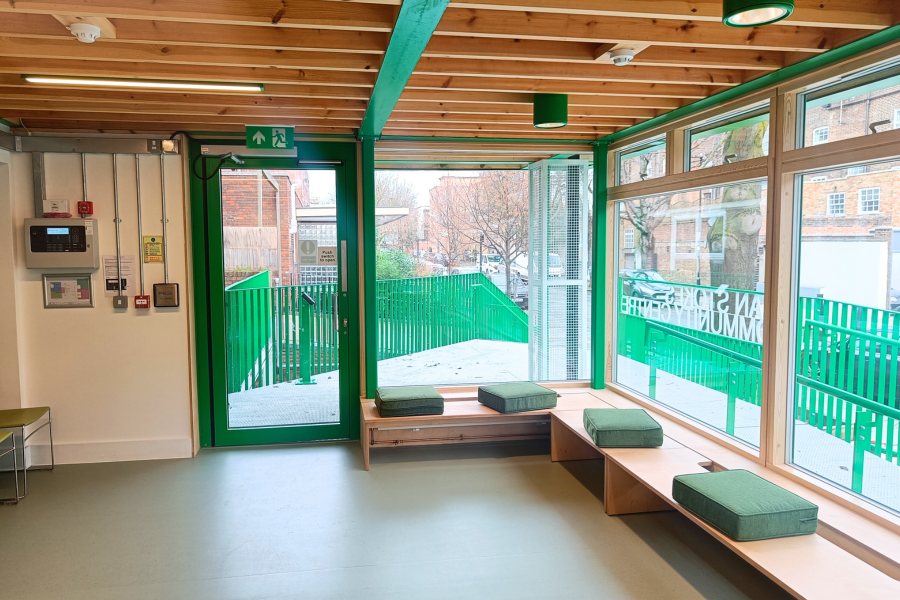 The community room is a fairly small room that has large windows with benches alongside them so you can sit down. It has a view out of the front of the centre onto the street.