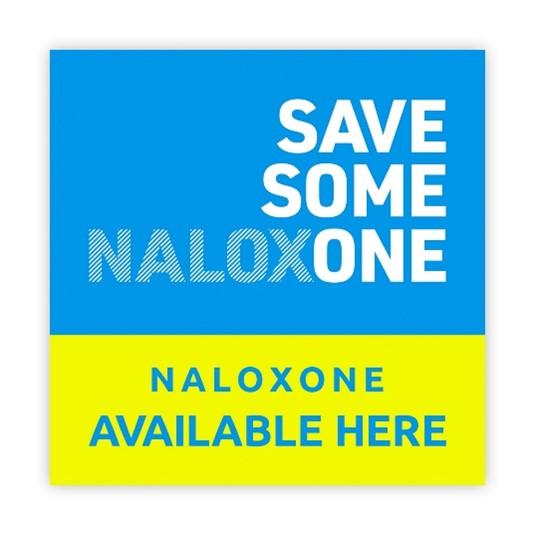 Yellow and blue sticker that says "Save someone. Naloxone available here."